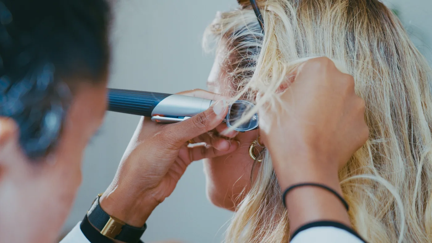 Professional ear examination at Divine Hearing